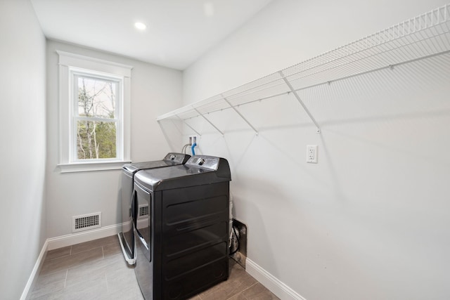 131 Exeter Rd, North Hampton, NH 03862 - laundry room with separate washer and dryer and recessed lighting