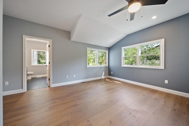 13 Raven St, Nashua, NH 03060 - empty room featuring ceiling fan, healthy amount of natural light, wood finished floors, lofted ceiling, and recessed lighting