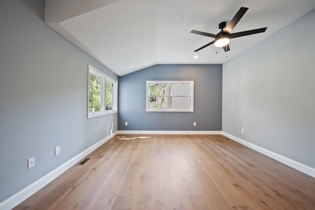 13 Raven St, Nashua, NH 03060 - spare room with vaulted ceiling, hardwood / wood-style flooring, and a ceiling fan