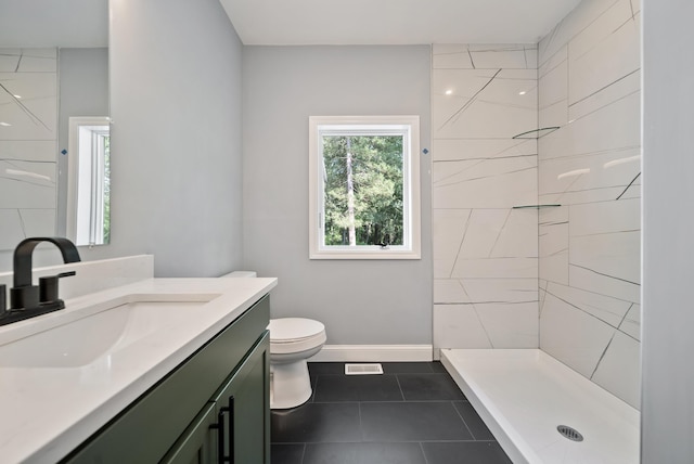 13 Raven St, Nashua, NH 03060 - full bathroom with vanity, a tile shower, and tile patterned floors