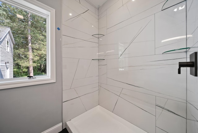 13 Raven St, Nashua, NH 03060 - bathroom featuring plenty of natural light and tiled shower