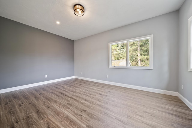 13 Raven St, Nashua, NH 03060 - unfurnished room featuring wood finished floors and recessed lighting