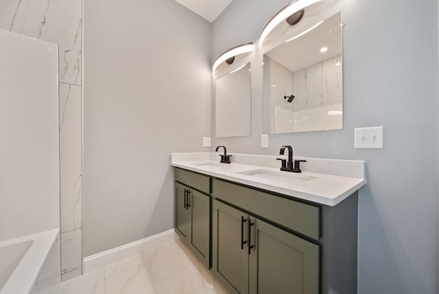 13 Raven St, Nashua, NH 03060 - bathroom featuring marble finish floors, double vanity, a tub to relax in, and a shower