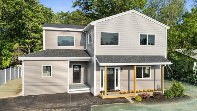 13 Raven St, Nashua, NH 03060 - view of front of property featuring roof with shingles and view of scattered trees