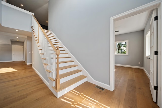 13 Raven St, Nashua, NH 03060 - stairway with wood finished floors and recessed lighting