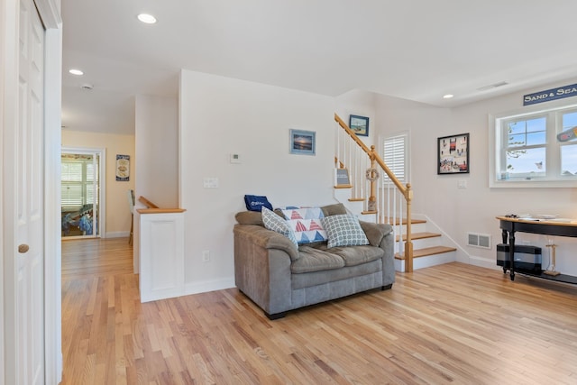 5 Fellows Ave, Hampton, NH 03842 - living room featuring light wood-style floors, plenty of natural light, stairway, and recessed lighting