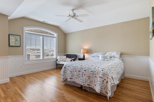5 Fellows Ave, Hampton, NH 03842 - bedroom with wood finished floors, wainscoting, vaulted ceiling, and a ceiling fan
