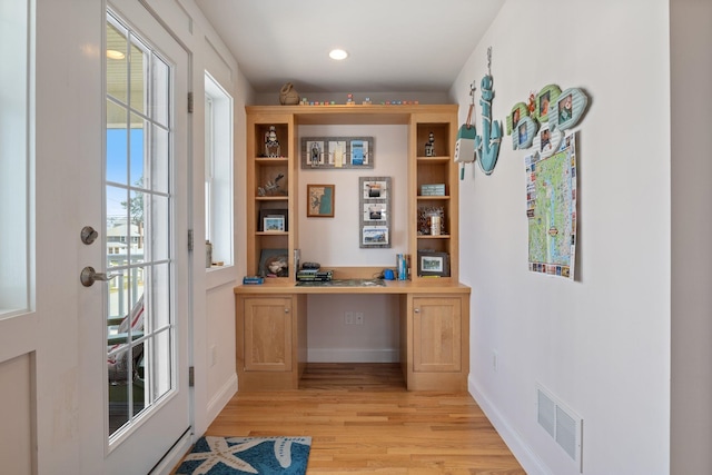 5 Fellows Ave, Hampton, NH 03842 - home office with built in study area, light wood finished floors, and recessed lighting