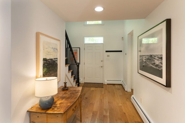 137 Wildes District Rd, Kennebunkport, ME 04046 - doorway featuring baseboard heating, light wood-type flooring, recessed lighting, and stairs