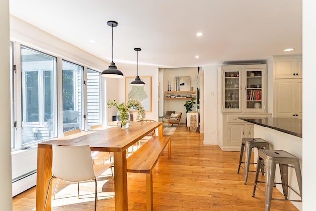 137 Wildes District Rd, Kennebunkport, ME 04046 - dining area featuring baseboard heating, light wood finished floors, and recessed lighting