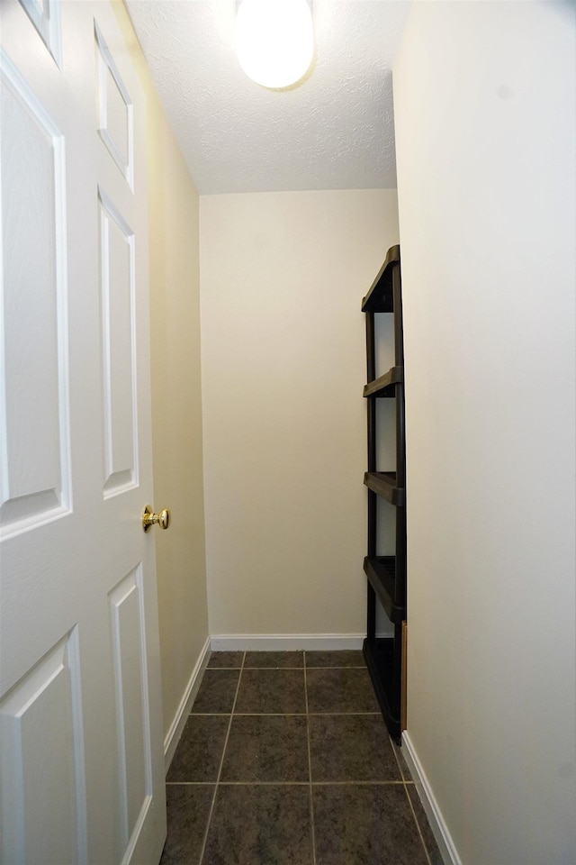 96 River Rd Unit 205, Manchester, NH 03104 - walk in closet featuring dark tile patterned floors