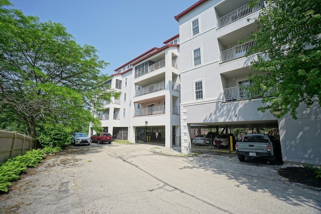 96 River Rd Unit 205, Manchester, NH 03104 - view of apartment building / complex featuring parking