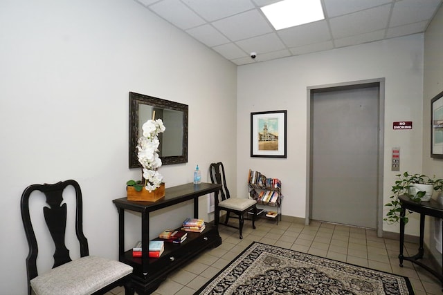 96 River Rd Unit 205, Manchester, NH 03104 - foyer entrance with light tile patterned flooring, a drop ceiling, and elevator