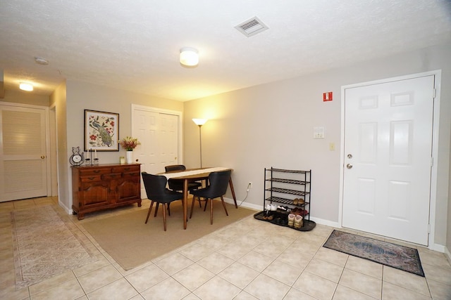 96 River Rd Unit 205, Manchester, NH 03104 - dining room with light tile patterned floors