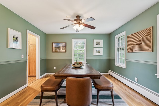 8 Willow Spring Ln, Hanover, NH 03755 - dining space with baseboard heating, wood finished floors, and ceiling fan