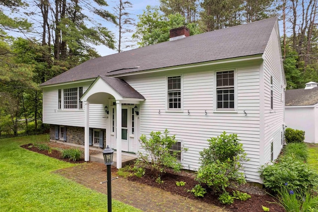 8 Willow Spring Ln, Hanover, NH 03755 - view of front of house featuring a chimney, a front lawn, and a shingled roof