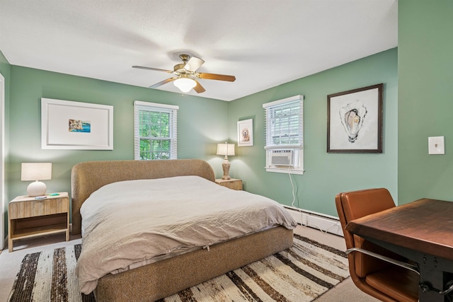 8 Willow Spring Ln, Hanover, NH 03755 - bedroom with a baseboard radiator, multiple windows, cooling unit, and a ceiling fan