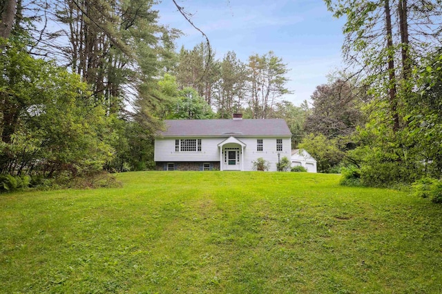 8 Willow Spring Ln, Hanover, NH 03755 - bi-level home featuring a chimney and a front lawn