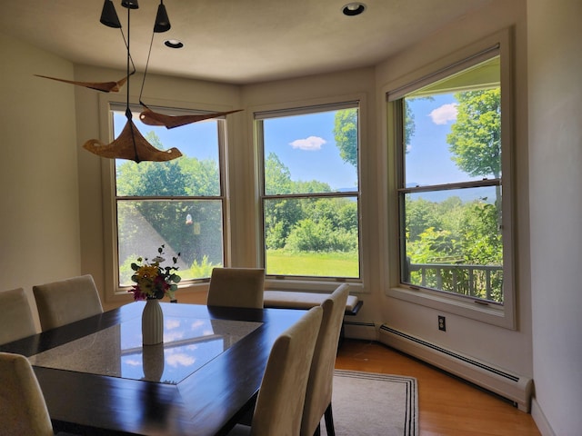 201 Lower Judson Ln, Stowe, VT 05672 - dining room with a baseboard radiator, wood finished floors, and recessed lighting