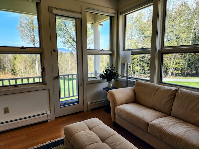 201 Lower Judson Ln, Stowe, VT 05672 - sunroom with a baseboard heating unit