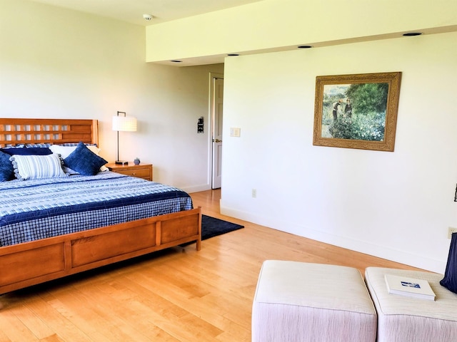 201 Lower Judson Ln, Stowe, VT 05672 - bedroom featuring light wood-type flooring and baseboards