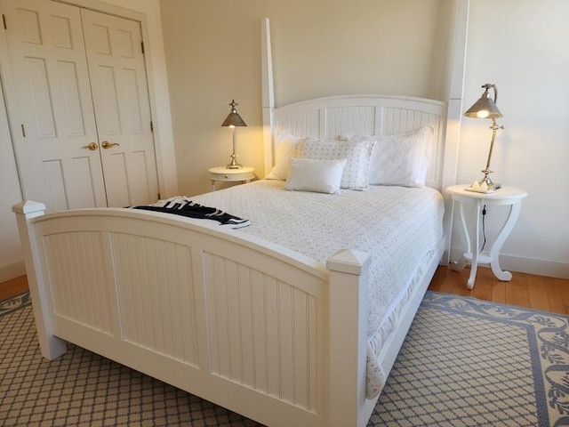 201 Lower Judson Ln, Stowe, VT 05672 - bedroom with wood finished floors and baseboards