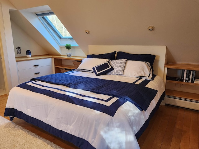 201 Lower Judson Ln, Stowe, VT 05672 - bedroom featuring a skylight, baseboard heating, and hardwood / wood-style floors