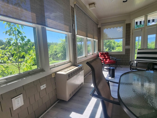 201 Lower Judson Ln, Stowe, VT 05672 - sunroom with wood finished floors and crown molding