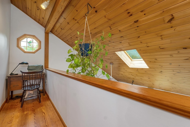 481 New Orchard Rd, Epsom, NH 03234 - corridor with a skylight, wood finished floors, wooden ceiling, healthy amount of natural light, and vaulted ceiling