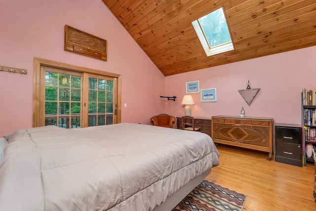 481 New Orchard Rd, Epsom, NH 03234 - bedroom with high vaulted ceiling, wood finished floors, a skylight, and wooden ceiling