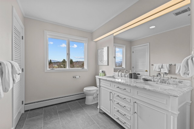 214 Upper Hollow Rd, Stowe, VT 05672 - full bath with a baseboard radiator, double vanity, and ornamental molding