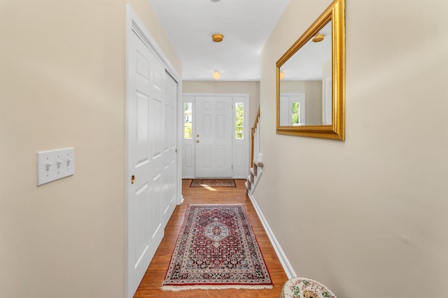 148 Deer Meadow Rd, Pittsfield, NH 03263 - doorway featuring wood finished floors and baseboards