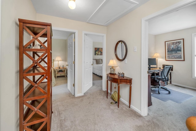 148 Deer Meadow Rd, Pittsfield, NH 03263 - hall with attic access, carpet, and a desk
