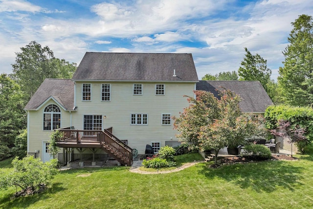 148 Deer Meadow Rd, Pittsfield, NH 03263 - back of property with a wooden deck, a yard, stairway, and a shingled roof