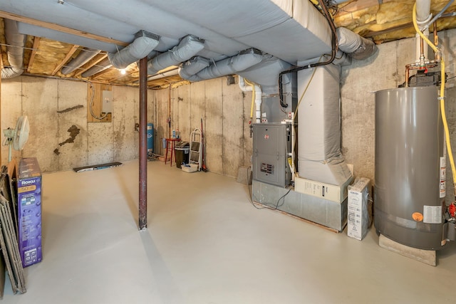 148 Deer Meadow Rd, Pittsfield, NH 03263 - unfinished basement featuring water heater, a water pressure tank, and heating unit