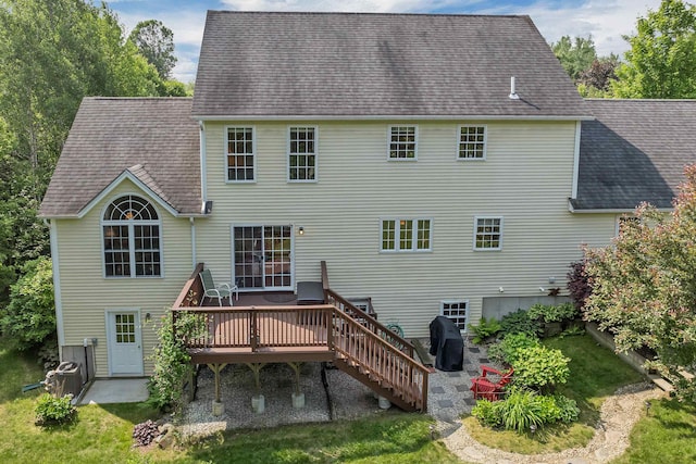 148 Deer Meadow Rd, Pittsfield, NH 03263 - back of house with a wooden deck, roof with shingles, a patio area, and stairway