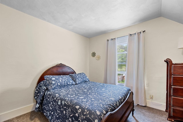11 Dudley St, Randolph, VT 05660 - carpeted bedroom with baseboards and vaulted ceiling