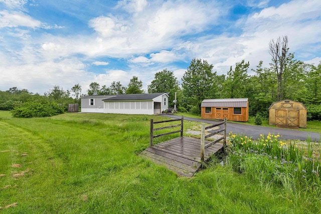205 Windsor Rd, Hillsborough, NH 03244 - view of green lawn with a shed