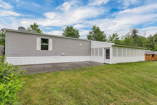 205 Windsor Rd, Hillsborough, NH 03244 - rear view of property featuring a yard and a storage shed