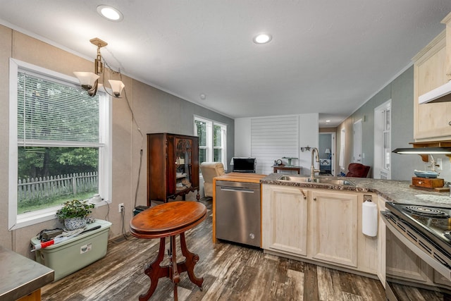 205 Windsor Rd, Hillsborough, NH 03244 - kitchen with appliances with stainless steel finishes, dark wood-type flooring, decorative light fixtures, ornamental molding, and a peninsula