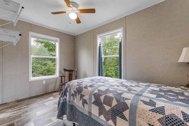 205 Windsor Rd, Hillsborough, NH 03244 - bedroom featuring wood finished floors, multiple windows, and a ceiling fan