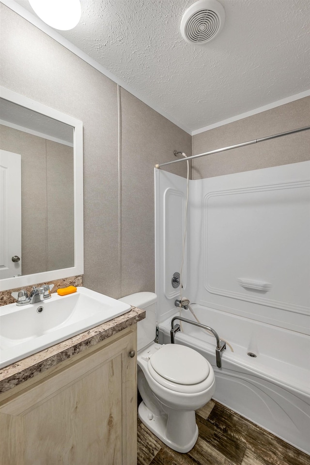 205 Windsor Rd, Hillsborough, NH 03244 - bathroom featuring tub / shower combination, vanity, wood finished floors, and a textured ceiling