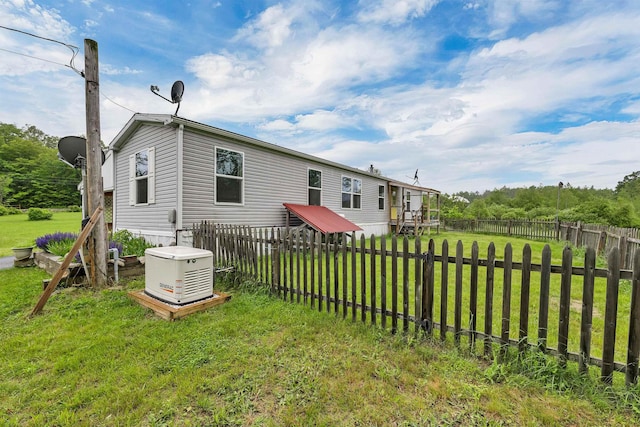 205 Windsor Rd, Hillsborough, NH 03244 - rear view of house featuring a fenced backyard