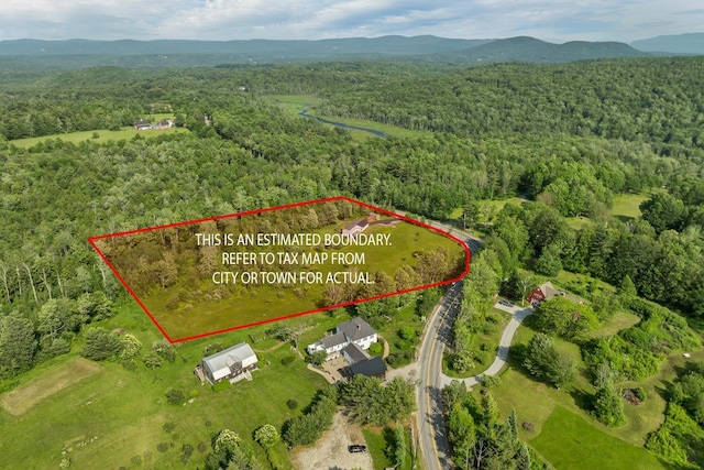 205 Windsor Rd, Hillsborough, NH 03244 - aerial view of property and surrounding area featuring property boundaries highlighted and a mountainous background
