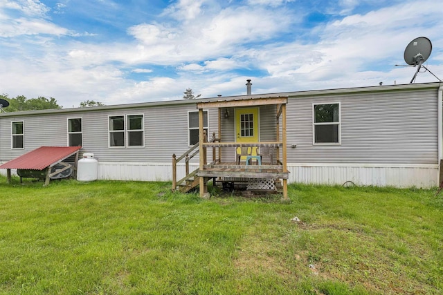 205 Windsor Rd, Hillsborough, NH 03244 - back of property featuring a yard and a wooden deck