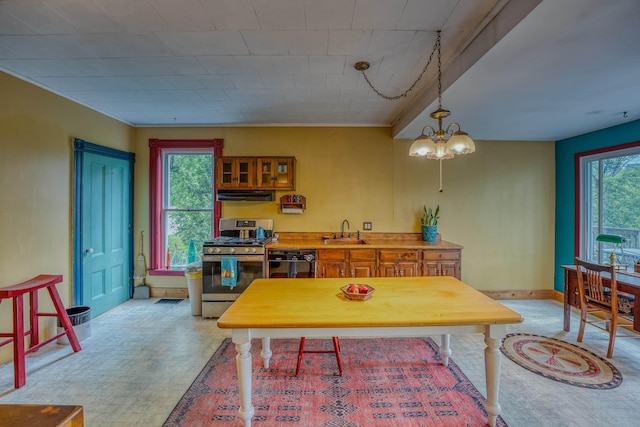 34 Union St, Littleton, NH 03561 - dining room featuring a chandelier and crown molding