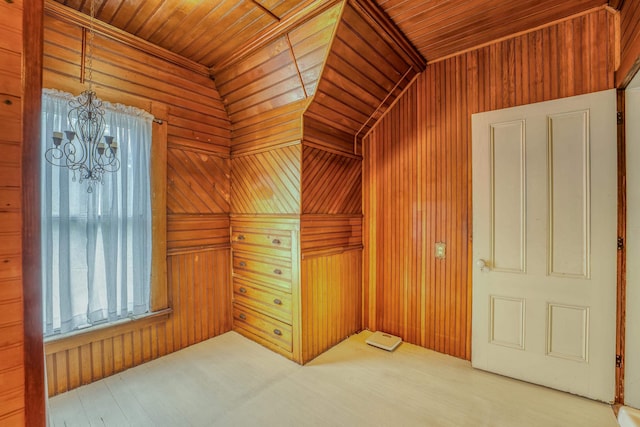 34 Union St, Littleton, NH 03561 - spare room with healthy amount of natural light, wooden walls, wooden ceiling, and a chandelier