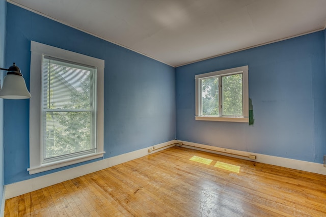 34 Union St, Littleton, NH 03561 - spare room with hardwood / wood-style flooring and baseboards