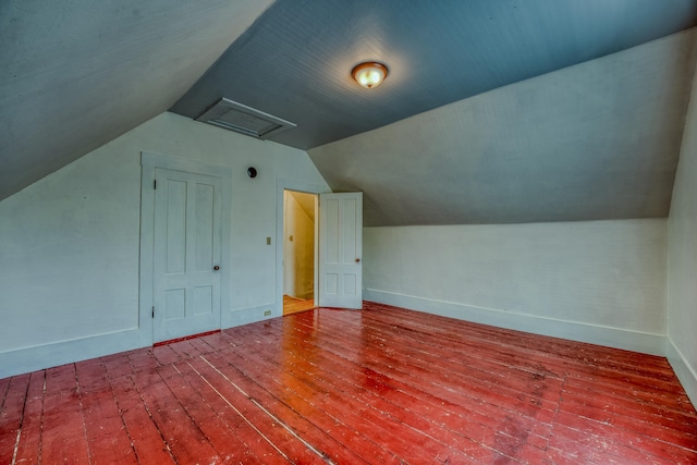 34 Union St, Littleton, NH 03561 - additional living space with attic access, lofted ceiling, and hardwood / wood-style floors