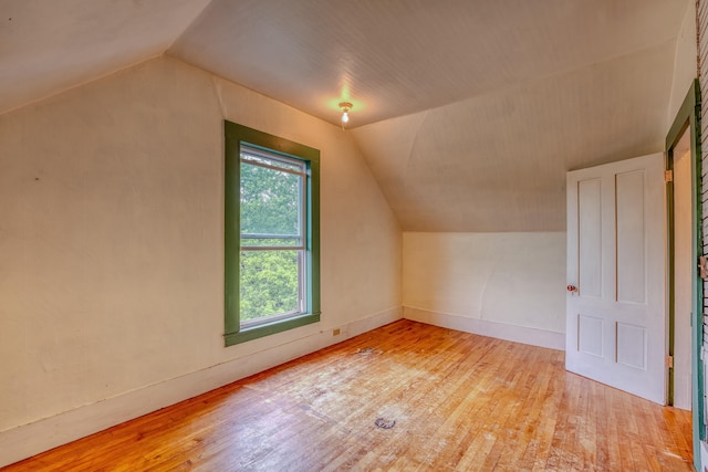 34 Union St, Littleton, NH 03561 - additional living space featuring lofted ceiling and hardwood / wood-style flooring